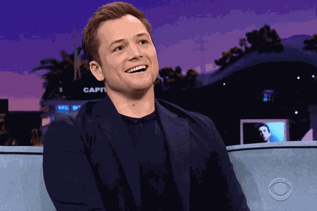 Taron Egerton Smiling GIF