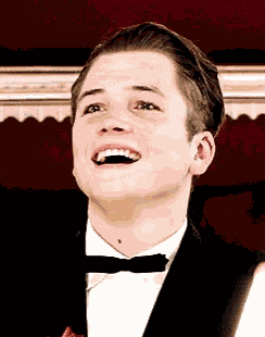 Taron Laugh GIF