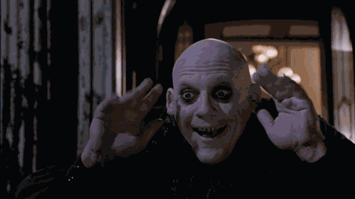 Uncle Fester Addams Family GIF