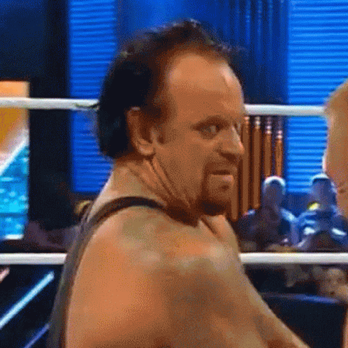 Undertaker Laughing Hysterically GIF