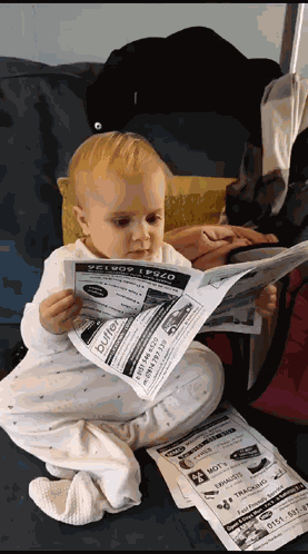 Up To Date Baby Reading GIF