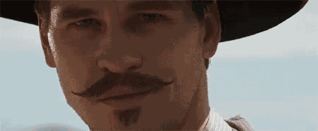 Wink Doc Holliday GIF