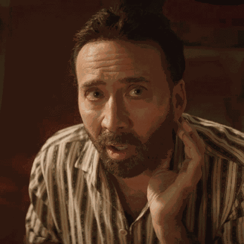Wink Nic Cage GIF