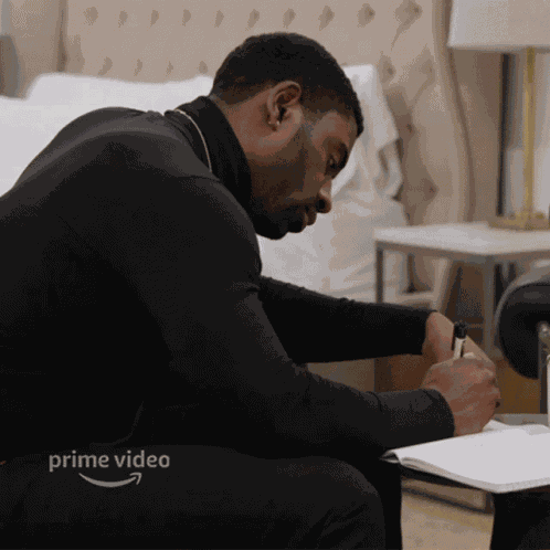 Writing Nigel GIF